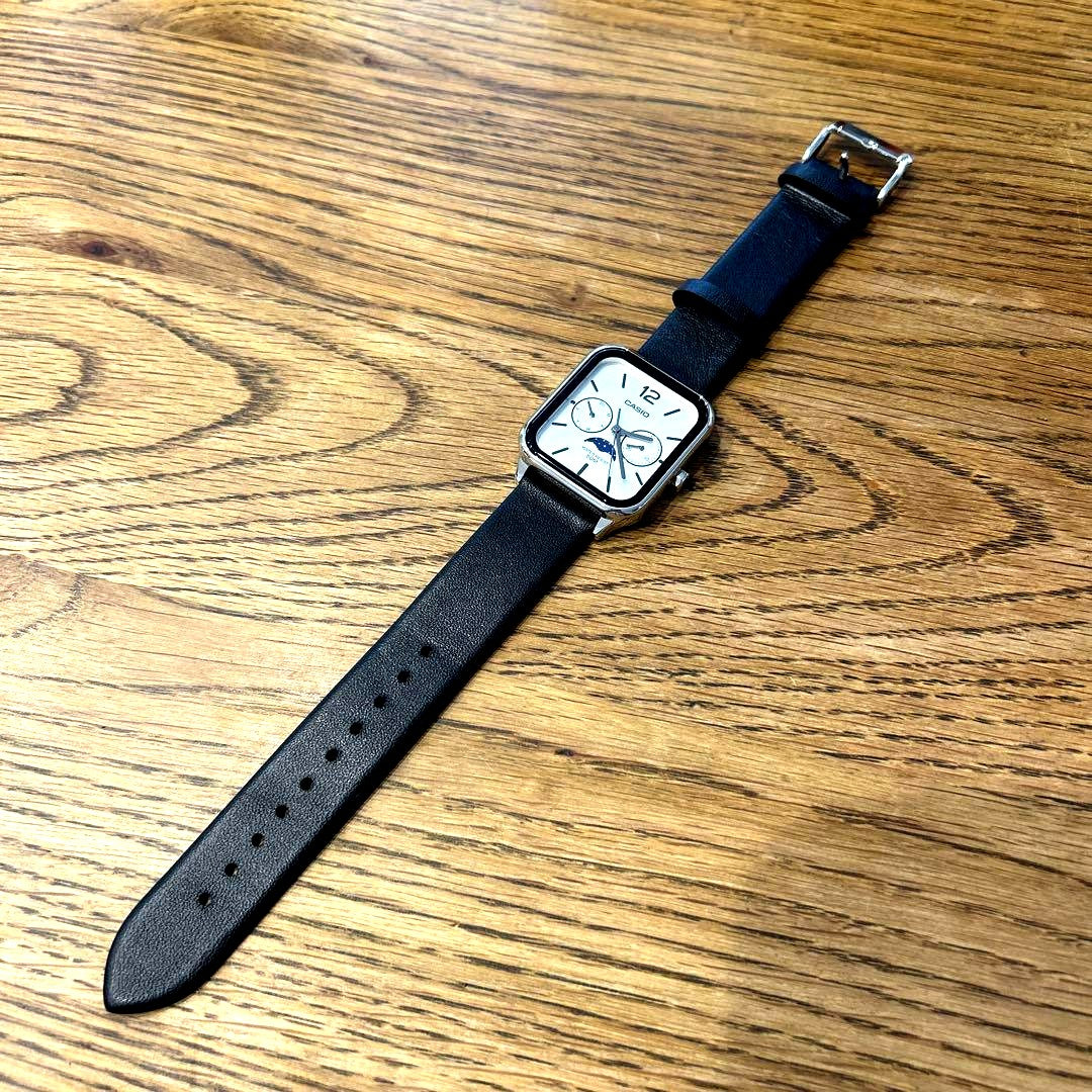 Casio MTP-M305L-7A wristwatch with white dial and black leather strap in excellent condition
