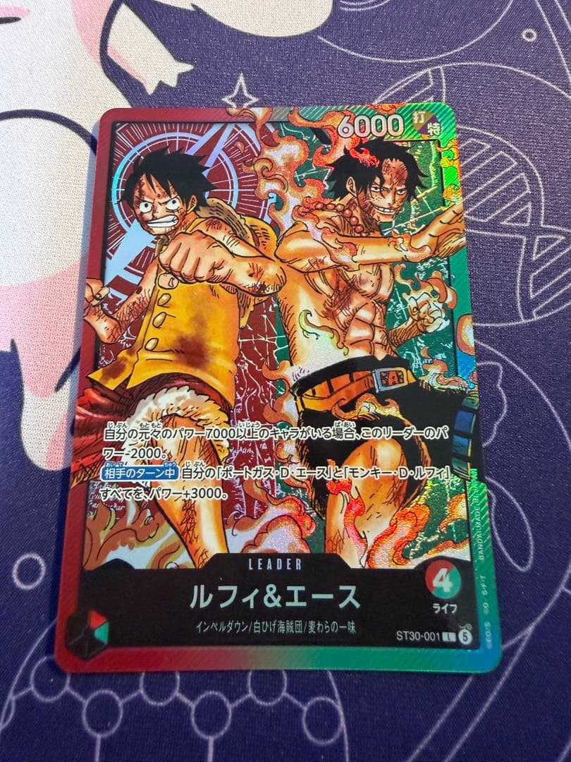 One Piece Card Game starter deck showing Monkey D Luffy and Portgas D Ace leader card ST30-001