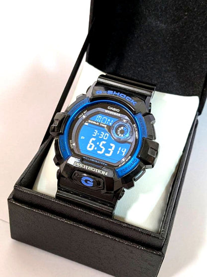 Casio G-Shock Digital Watch in black and blue with a digital display and shock resistance