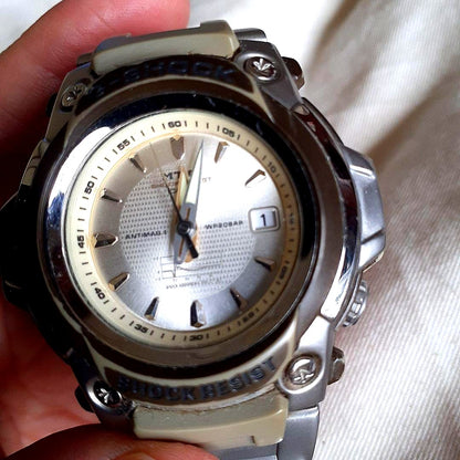 Casio G-Shock MT-G MTG-101 watch with thin yellow lemon-colored dial and black strap