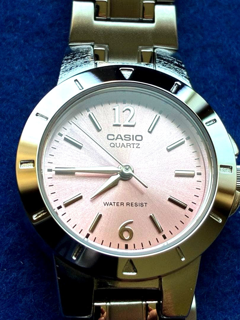Casio LTP-1177A-4A1JH quartz wristwatch with pink dial and metal band