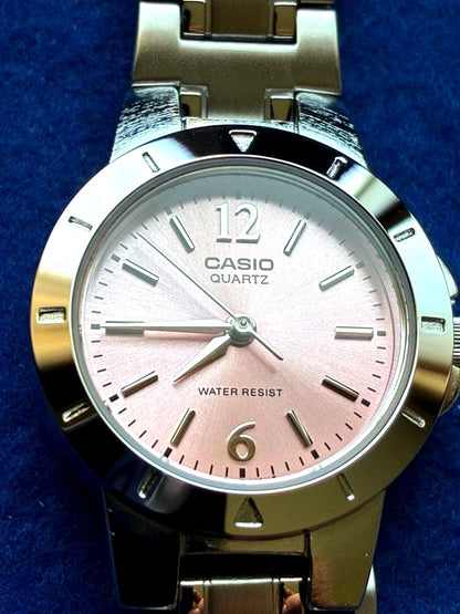 Casio LTP-1177A-4A1JH quartz wristwatch with pink dial and metal band