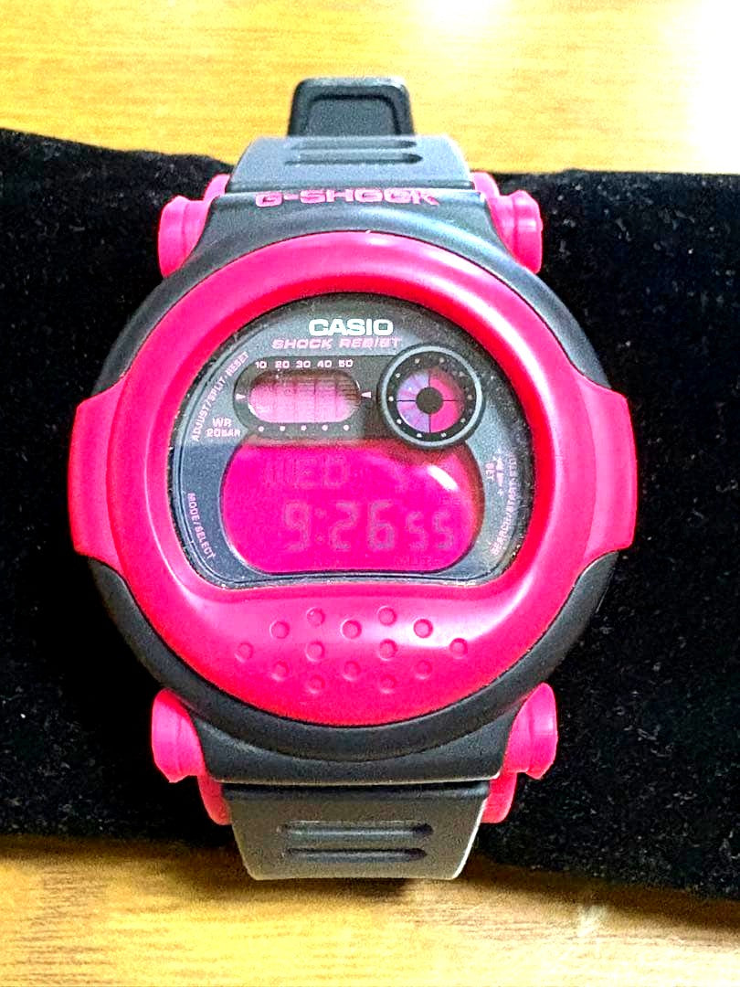 Used Casio G-Shock Digital Watch model G-001 in pink with digital display and backlight