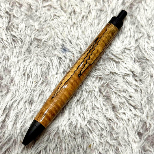 Handmade Kihada wood pen with figured spalted maple grain and glossy lacquer finish