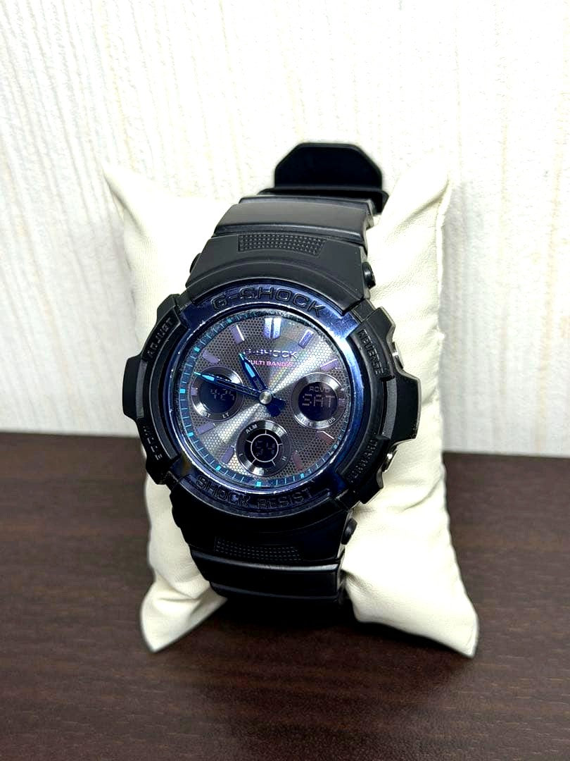 Casio AWG-M100SVB-1AJF digital analog watch showing black dial with shock and water resistance features