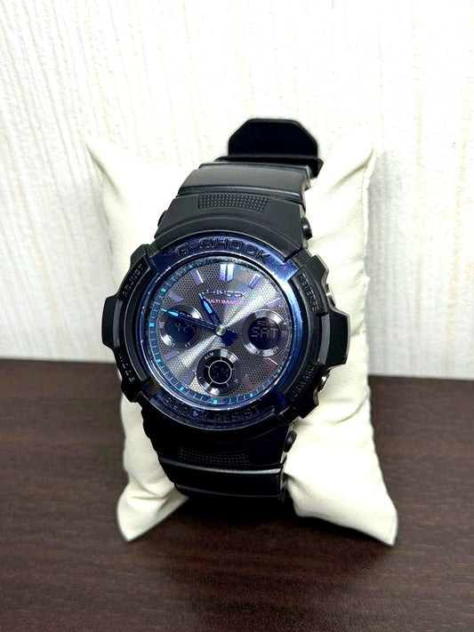 Casio AWG-M100SVB-1AJF digital analog watch showing black dial with shock and water resistance features