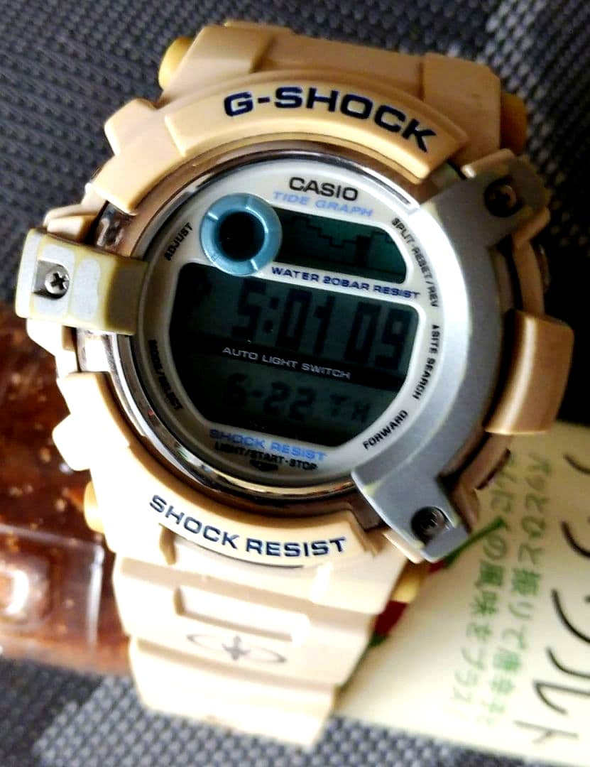 Casio G-Shock Triple Crown GL-130TC digital watch showing tidegraph and moon data