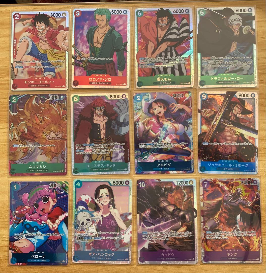 Bandai One Piece Romance Dawn SR 12 Card Set showing Luffy Zoro and Law collectible cards