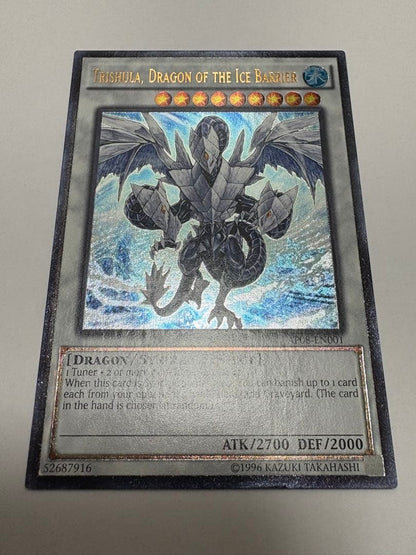 Yugioh Ice Conclave of the Dragon Trishula English Relief card from North America with visible dent on bottom back