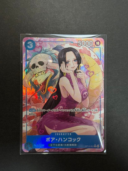 One Piece trading cards featuring Boa Hancock SR and S-Snake R characters from Japan
