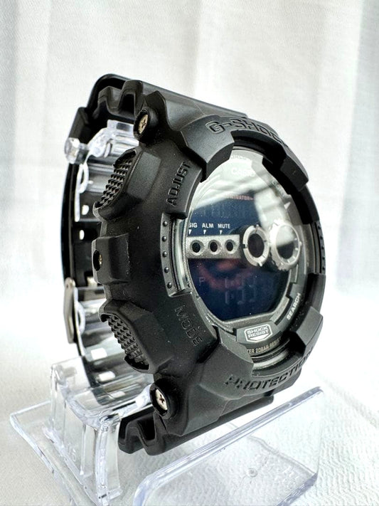 Casio G-Shock GD-100-1BJF digital watch with black bezel and band shown with box Japan import