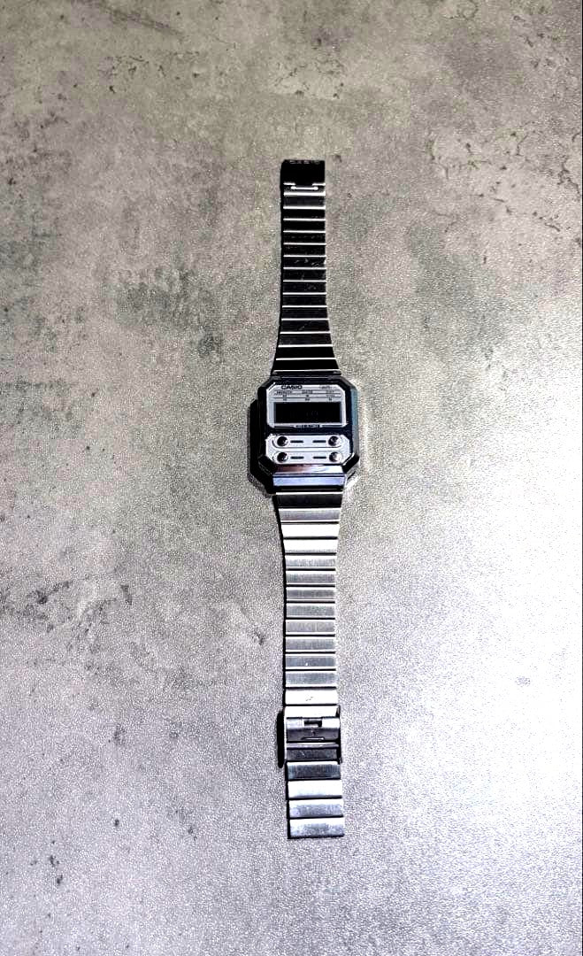 Casio Digital Watch A100WE silver stainless steel body with retro digital display and water resistance