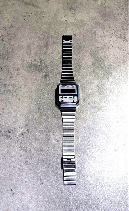 Casio Digital Watch A100WE silver stainless steel body with retro digital display and water resistance