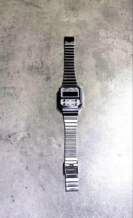 Casio Digital Watch A100WE silver stainless steel body with retro digital display and water resistance