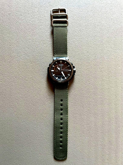 Casio Pro Trek PRW-60Y wristwatch with black dial and exchange band showing minor scratch on bezel