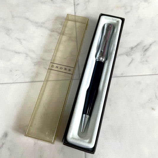 Cross brand vintage ballpoint pen with yellowed case and black ink tested, unused interior