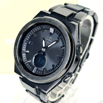 Casio BabyG MSG-W200CG black solar radio wave watch with metal cover and band on white background