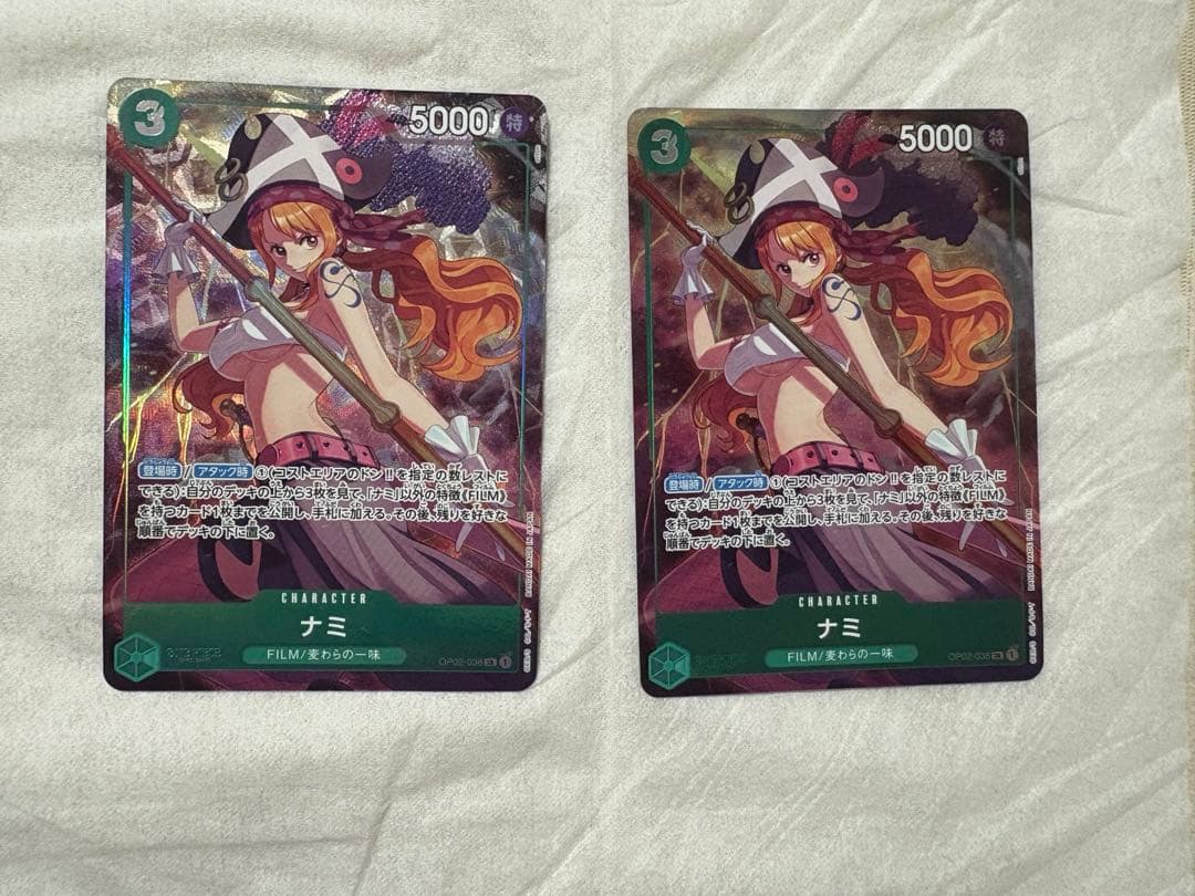 One Piece Nami OP02-036 Premium Card Collection parallel card from Japan import, featuring Japanese text.