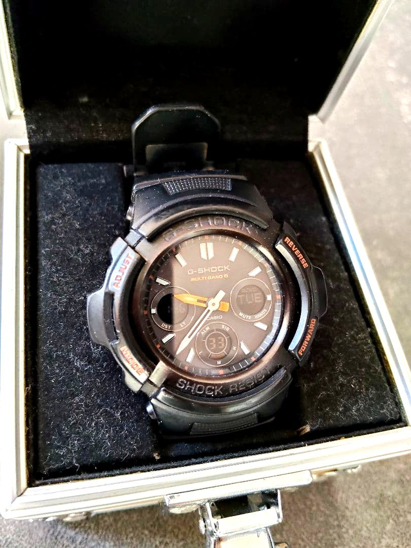 Casio G-Shock AWG-M100F radio solar watch with trunk-style case, black bezel, and band