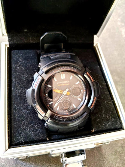Casio G-Shock AWG-M100F radio solar watch with trunk-style case, black bezel, and band