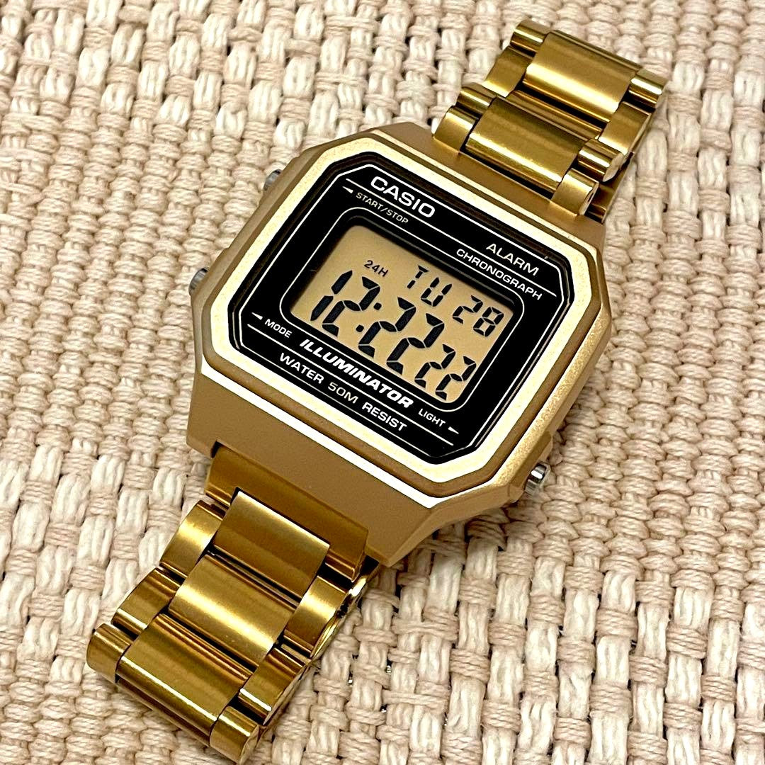 Casio digital wristwatch with gold metal case and replacement metal band, Japan import