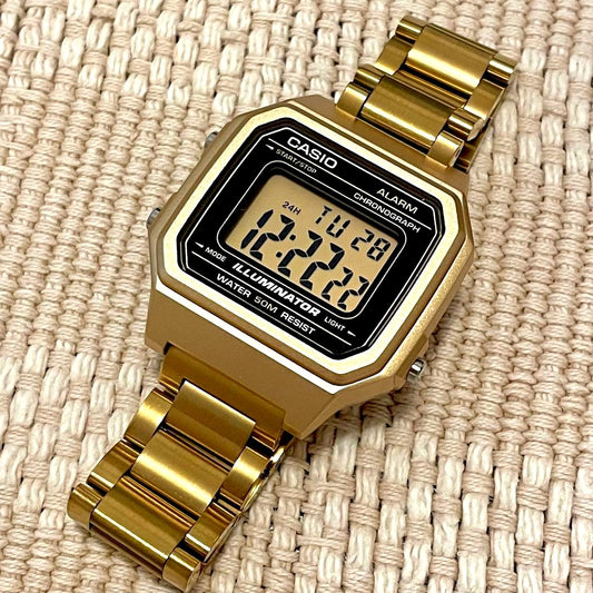 Casio digital wristwatch with gold metal case and replacement metal band, Japan import