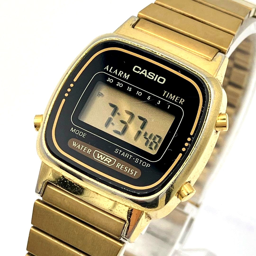 Casio Y2K gold stainless steel wristwatch with clear dial and gold-tone bracelet, new battery installed
