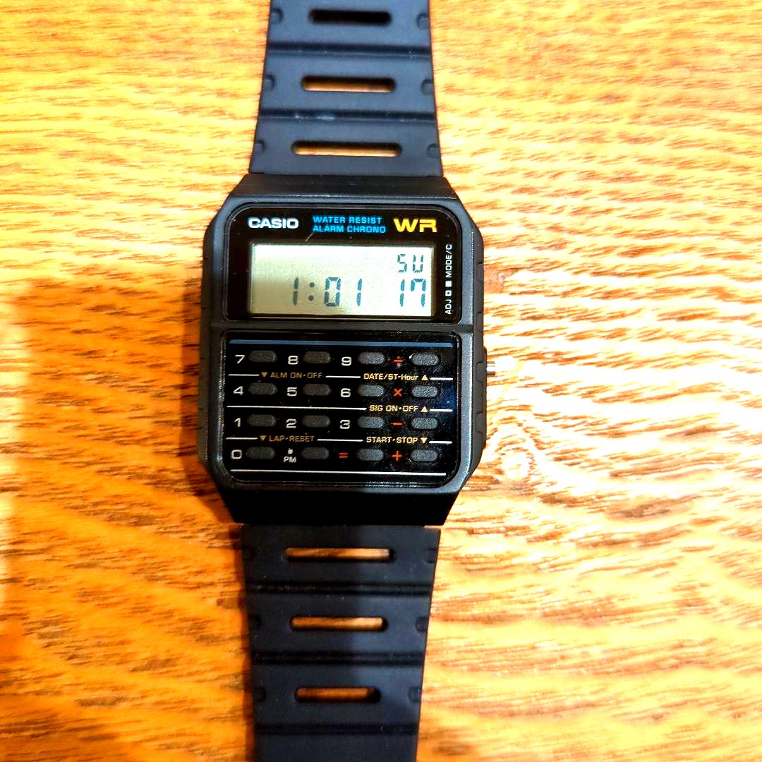 Used Casio Data Bank CA-53W black digital watch with rectangular display showing calculator and dual time functions