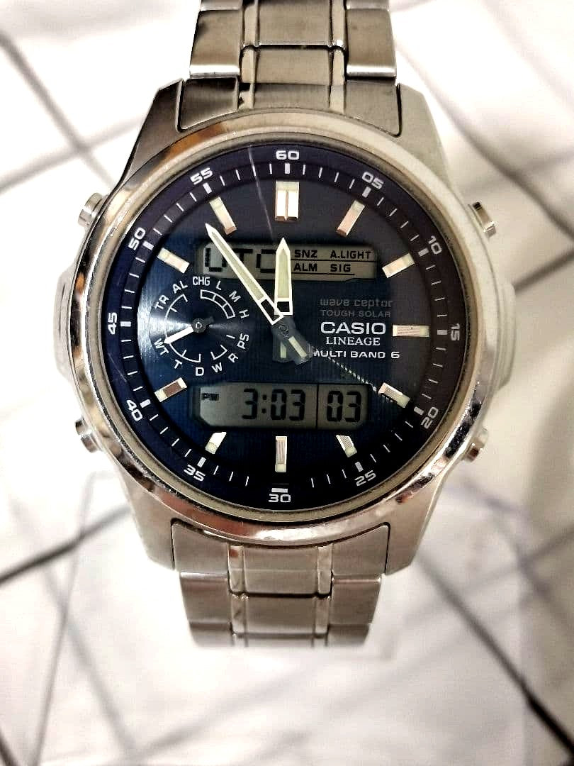 Casio Lineage LCW-M300 solar radio wave combination watch with navy dial and analog-digital display