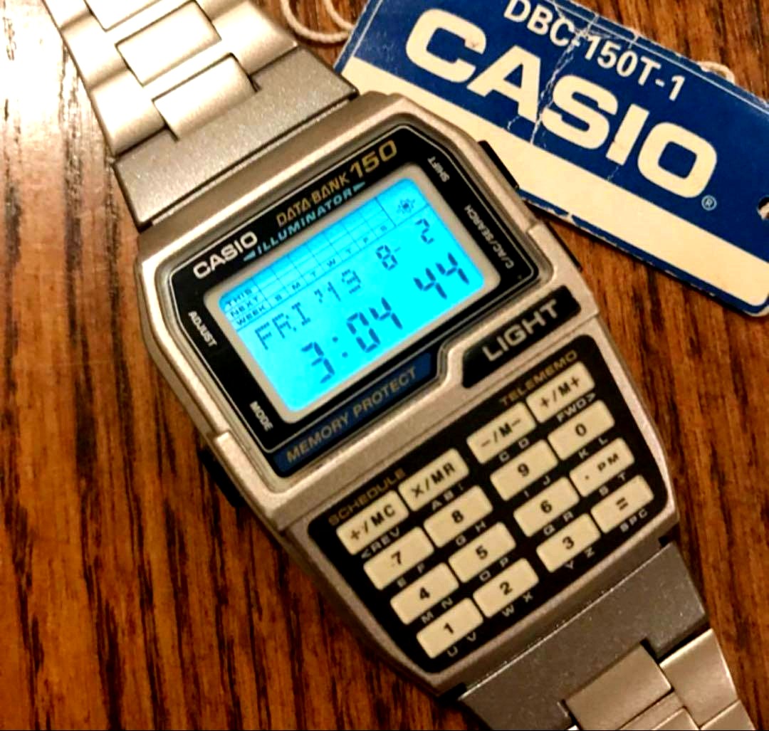 Casio DataBank DBC-150T-1 used wristwatch with digital display and black strap
