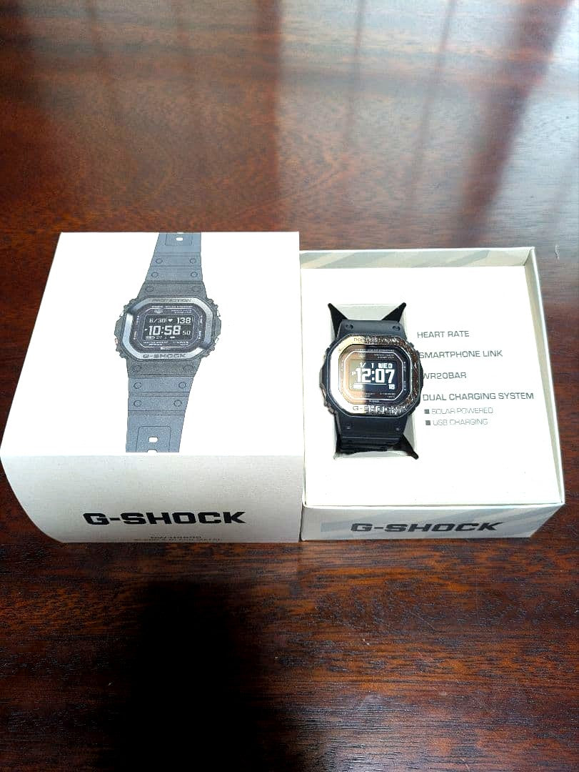Casio G-Squad Series DW-H5600 digital watch with black bezel and digital display showing time