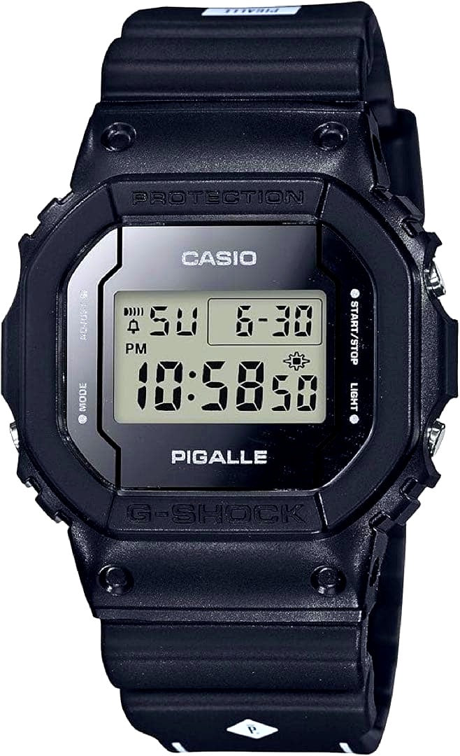 Casio G-Shock PIGALLE digital watch with black rubber band showing digital display