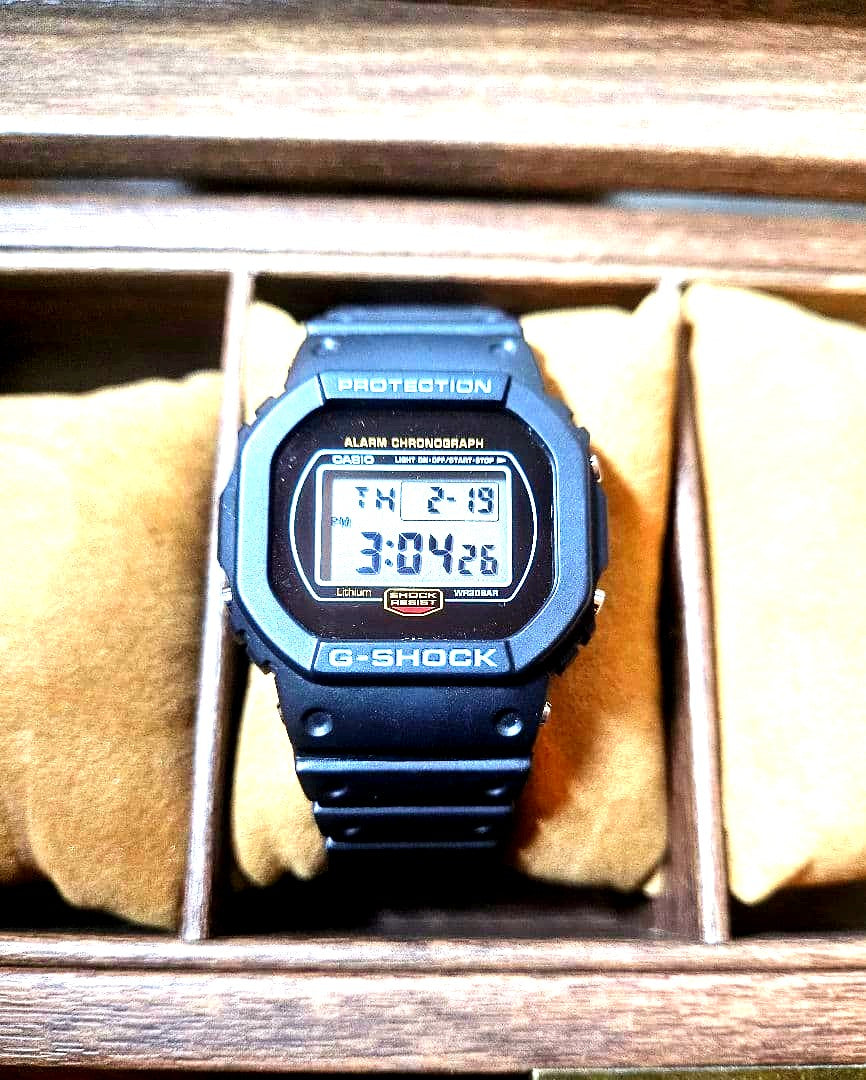 Casio G-Shock DW-5700 watch with screw-back case and DW5600 bezel conversion in excellent condition