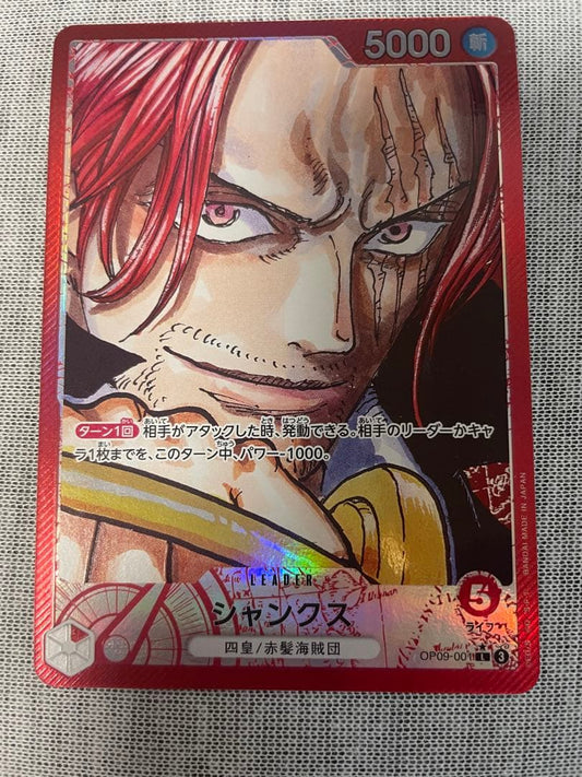 One Piece Shanks Leader Parallel OP09-001 Japanese trading card with minor wear for play use