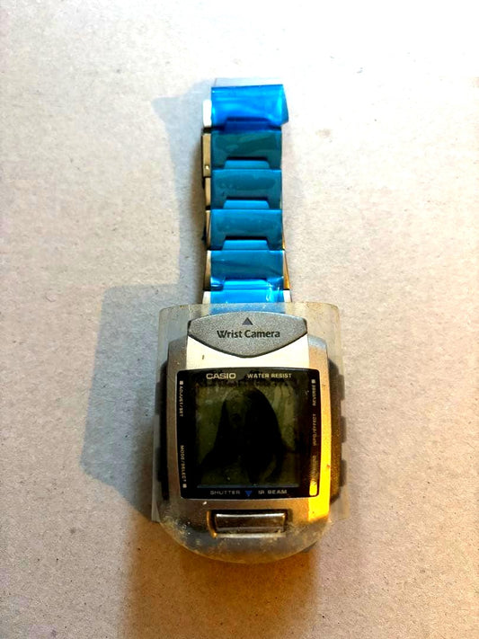 Casio Wrist Camera digital watch showing built-in camera and USB port Japan import