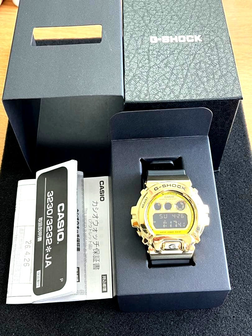 Casio G-Shock GM-6900G watch in black with silver bezel and digital display