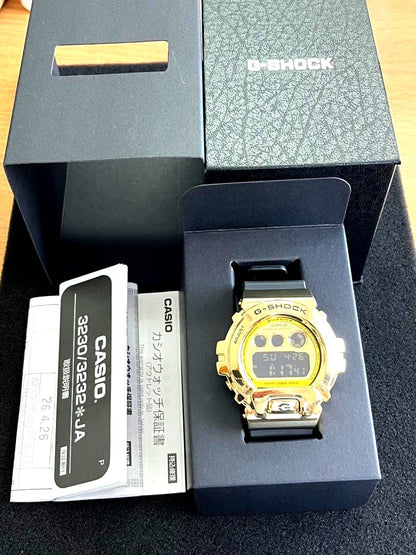 Casio G-Shock GM-6900G watch in black with silver bezel and digital display