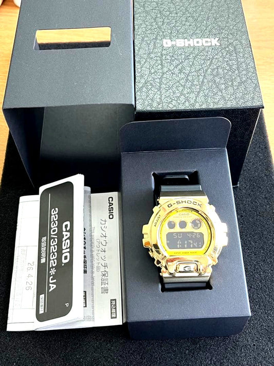 Casio G-Shock GM-6900G watch in black with silver bezel and digital display