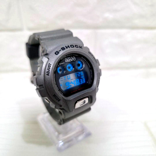 Casio G-Shock DW-6900M-8T Eric Haze limited collaboration silver watch with mirror LCD and blue backlight