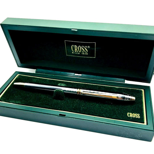 Cross Twist Ballpoint Pen with glossy silver body and gold accents, shown with dedicated case
