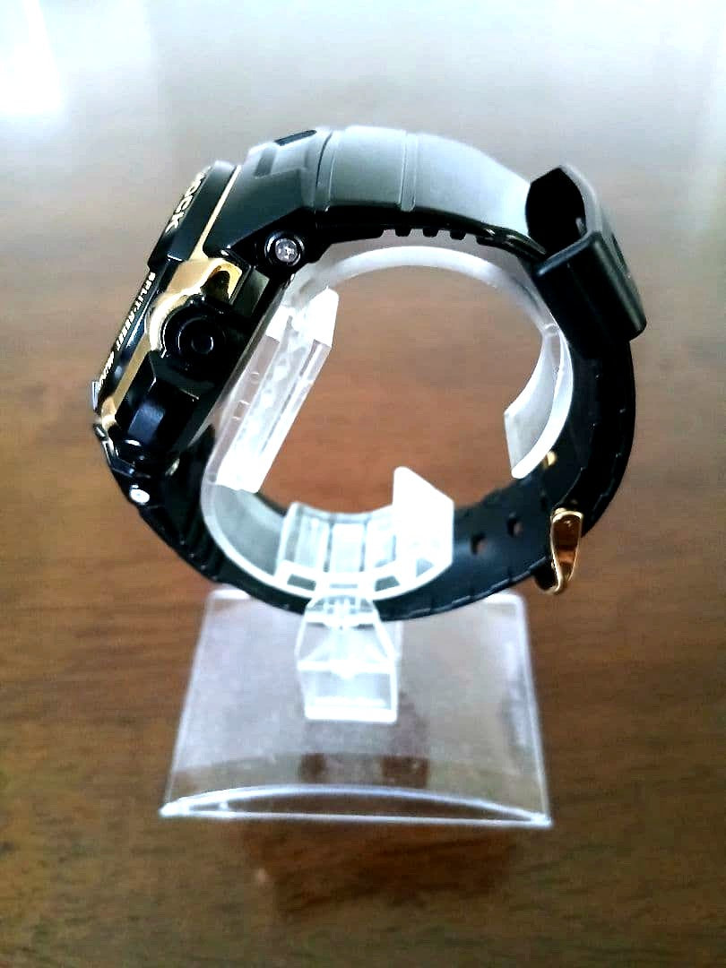 Casio G-Shock G-7700G digital watch in black and gold with digital display and shock resistance