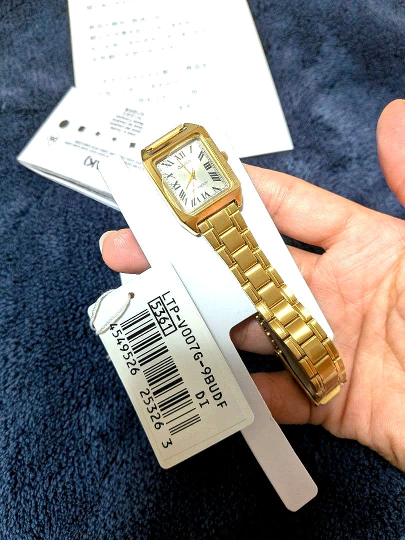 Casio Standard LTP-V007G-9B gold rectangle analog wristwatch with Roman numeral dial and quartz movement
