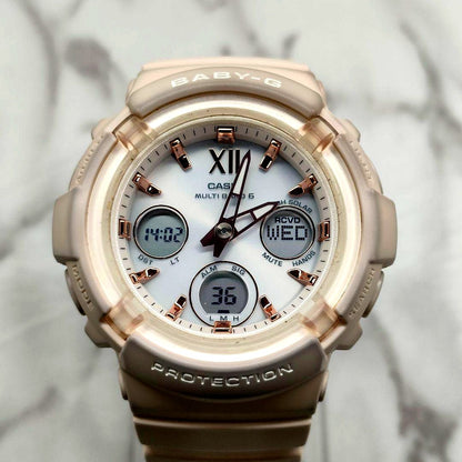 Casio Baby-G BGA-2800 pink beige watch with visible signs of use and discoloration