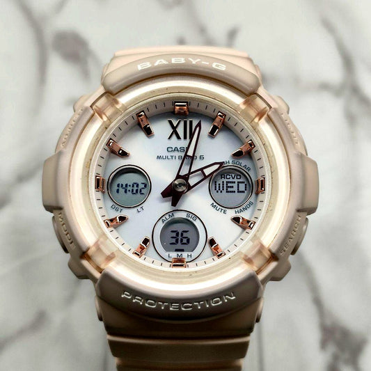 Casio Baby-G BGA-2800 pink beige watch with visible signs of use and discoloration