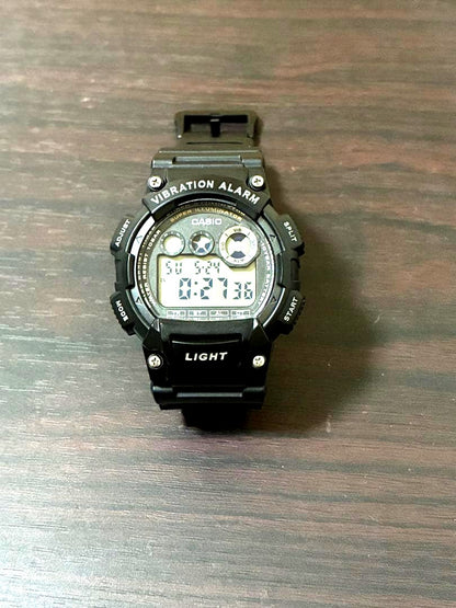 Casio W-735H digital watch with vibration alarm and 10 ATM water resistance in black color