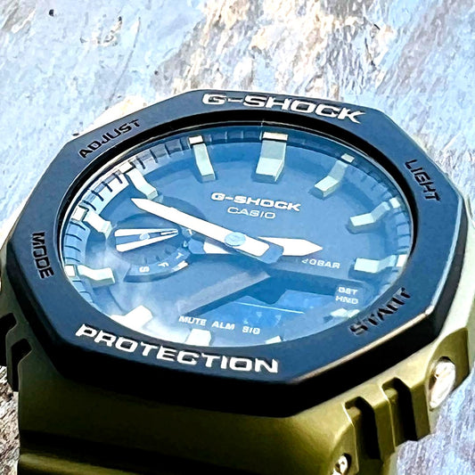Casio G-Shock GA-2110SU-3AJF olive green watch with octagonal bezel and analog-digital display