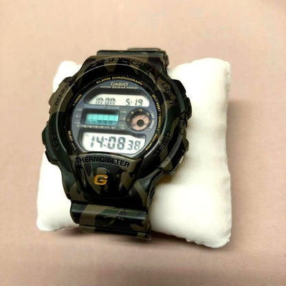 Casio G-Shock DW-6100 mens watch with camouflage pattern and black band, Japan import