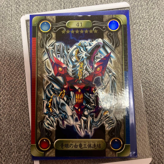 Bandai Blue-Eyes White Dragon three connected figures from Yu-Gi-Oh with minor top scratches