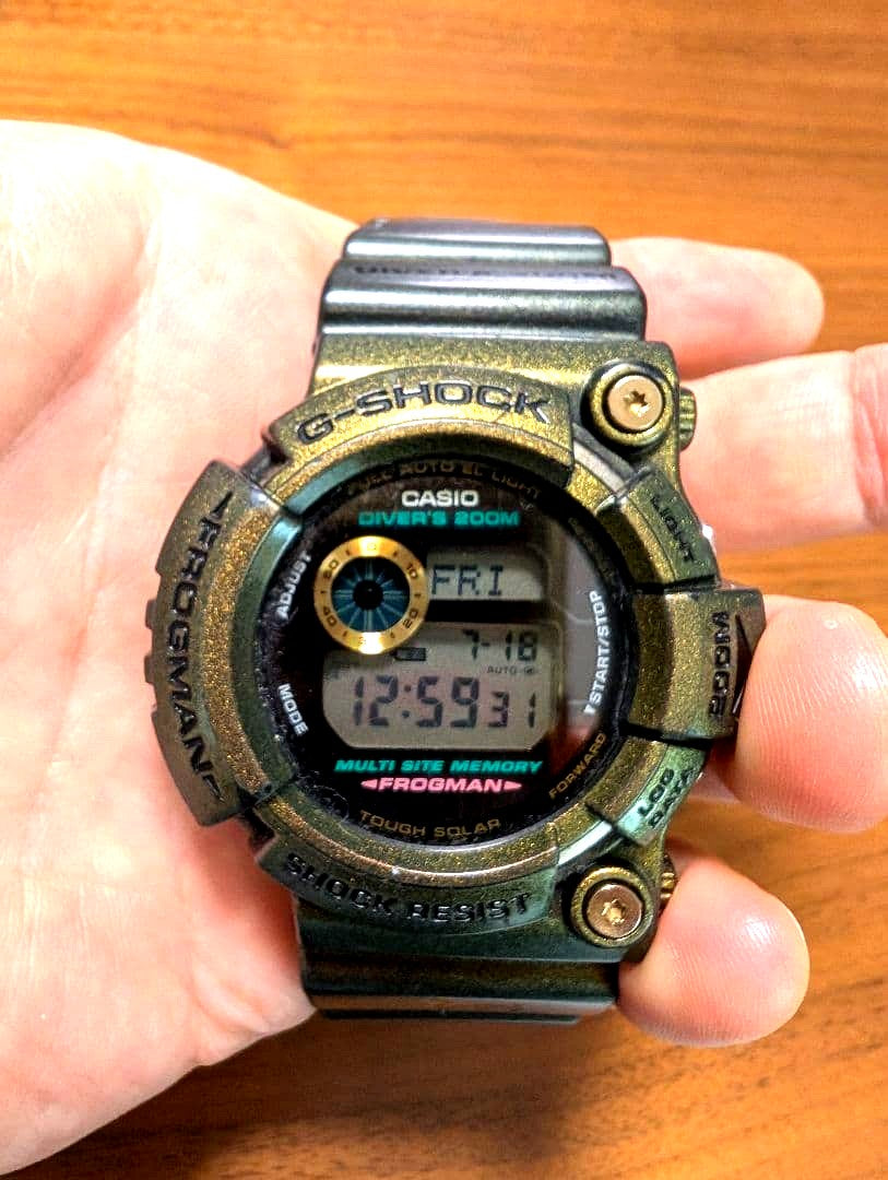 Casio G-Shock Frogman GW-200 diver's watch in black and green with replaced black loop, shown from front