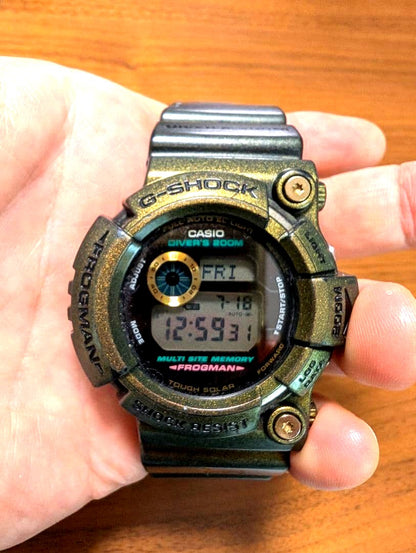 Casio G-Shock Frogman GW-200 diver's watch in black and green with replaced black loop, shown from front